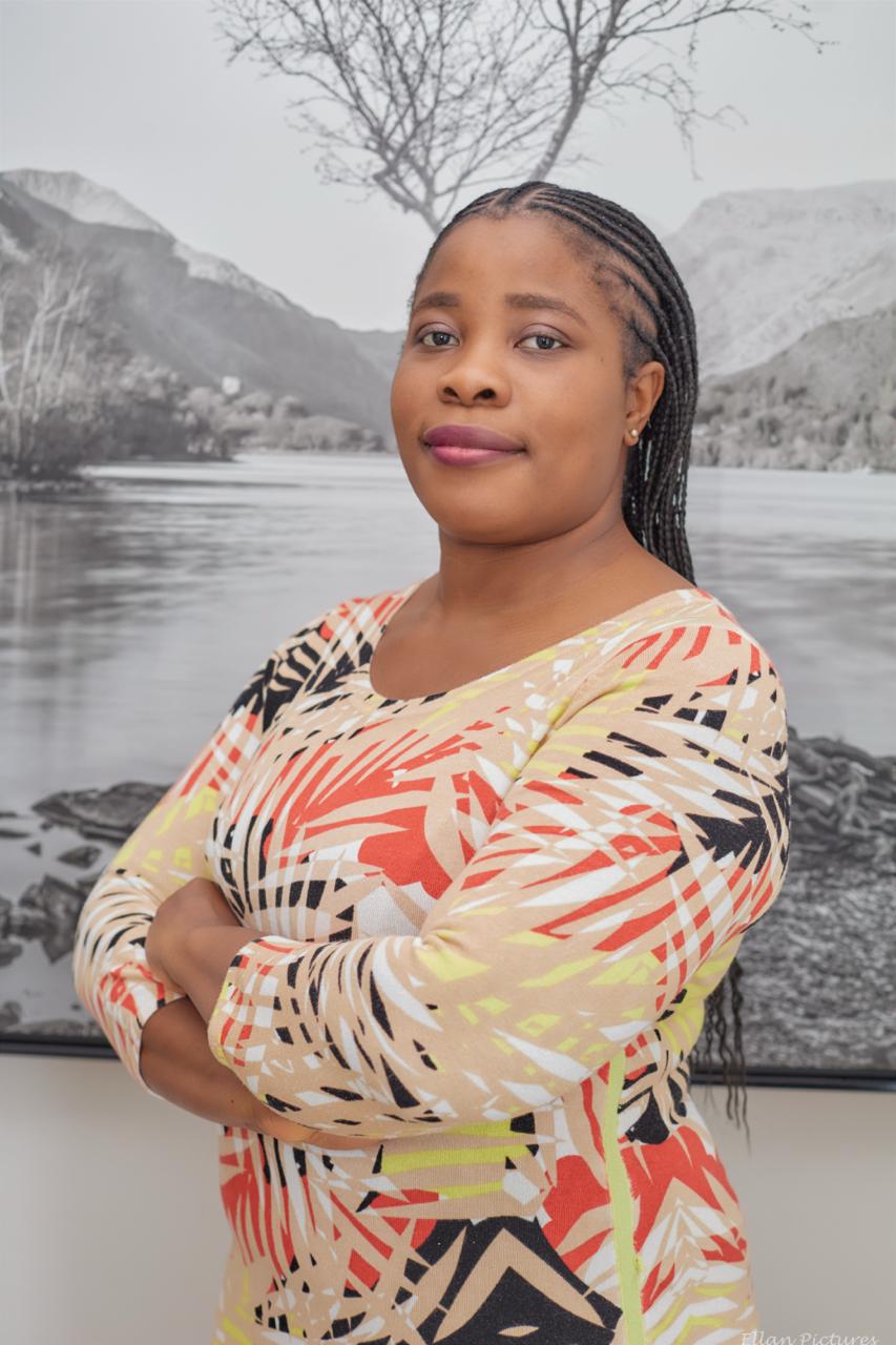 Portrait of Toluwalope Dare, founder of Elyon Immigration Consulting